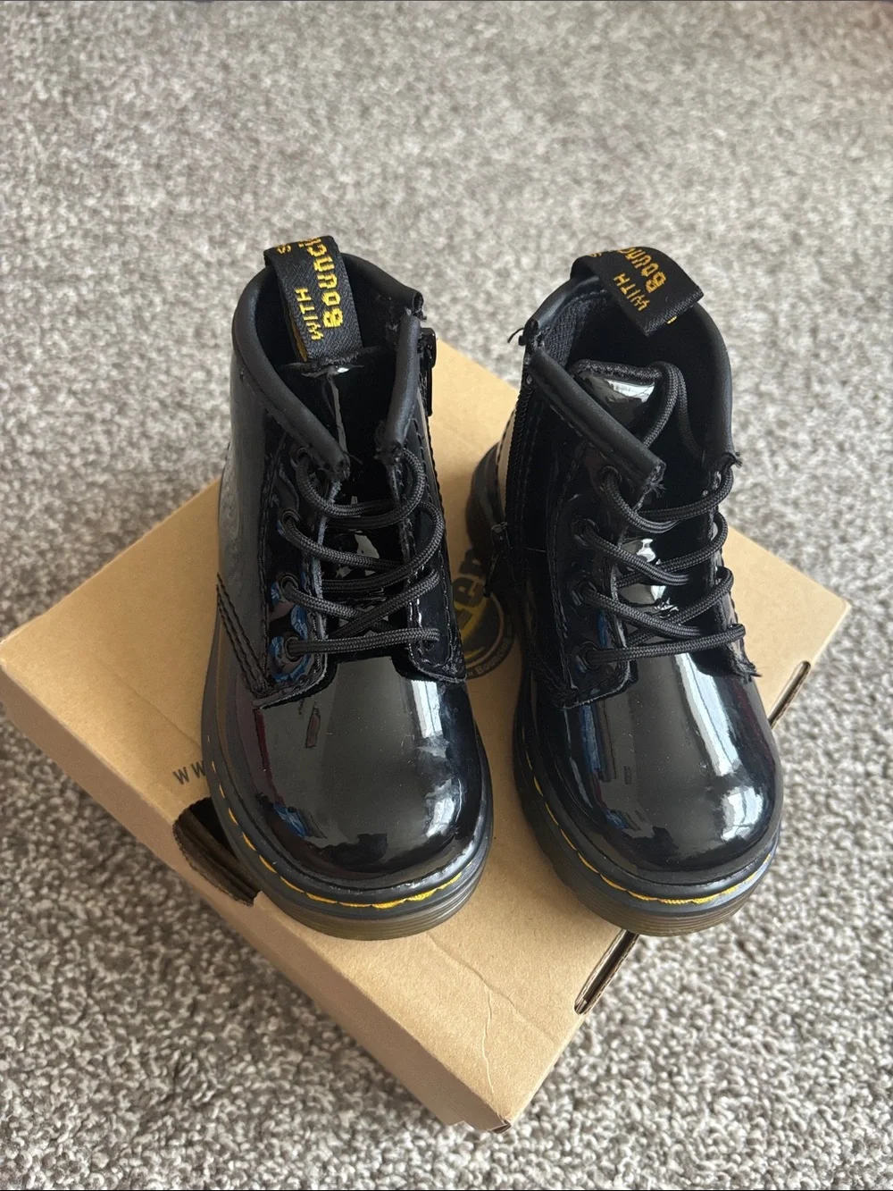Dr. Martens Kids Black Patent Lace-Up Boots with Yellow Stitching